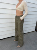 Meshki Ribbed Long Sleeve Twist Front Crop Top Cream - Image 1